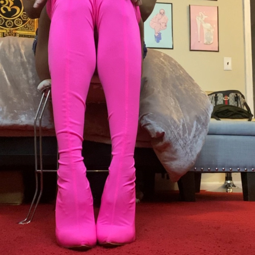 Neon pink thigh high pull up pump boots
